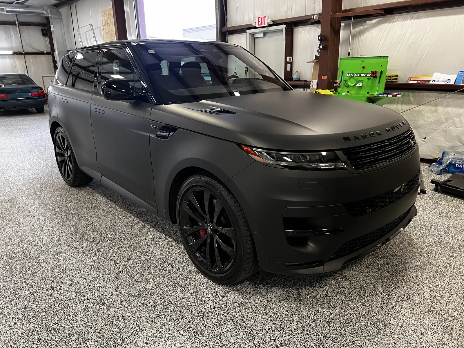 Matte black full wrap — Range Rover Sport